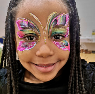 pink butterfly face painting