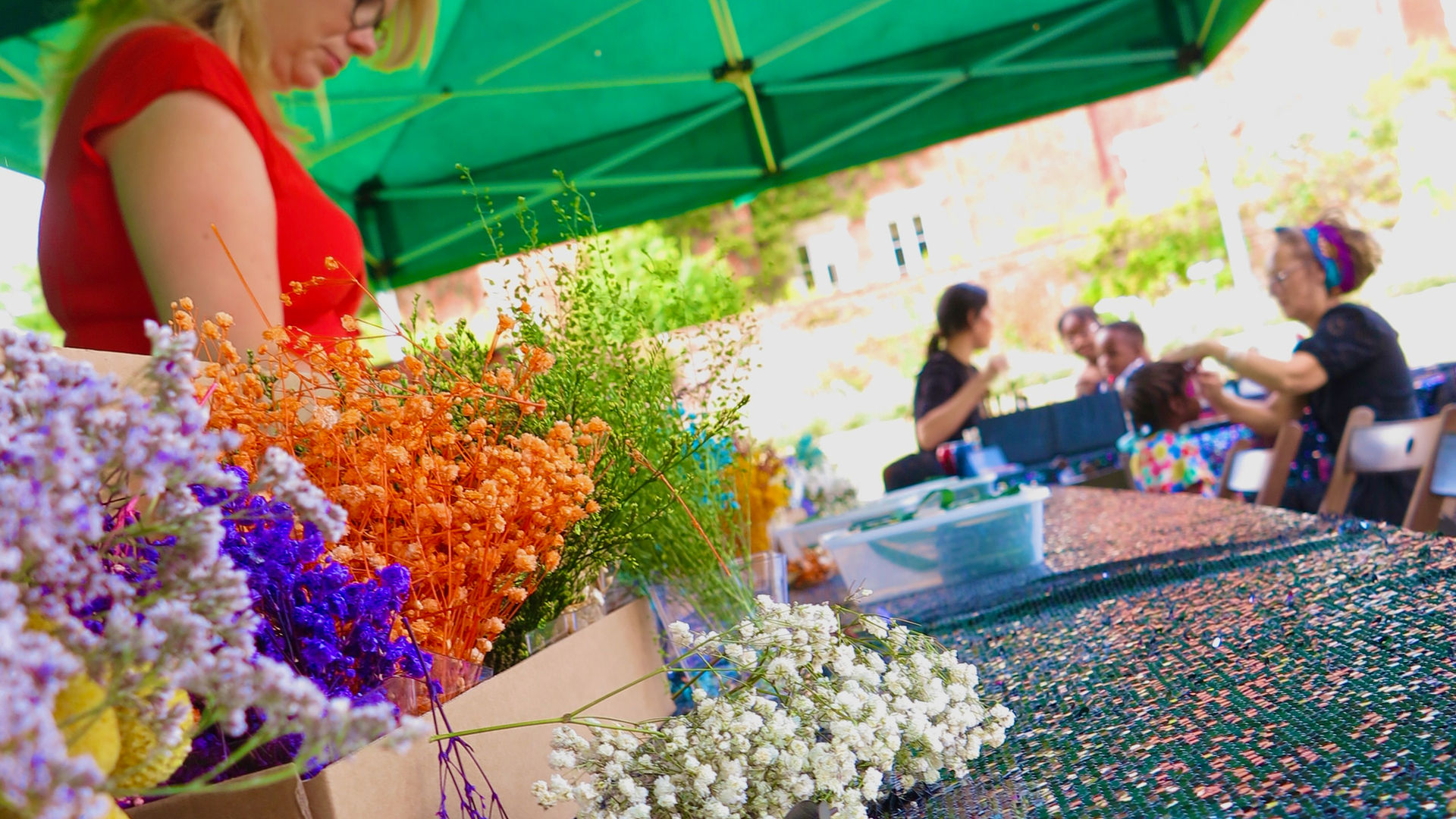 Flower crown workshops and face painting combined at a corporate event