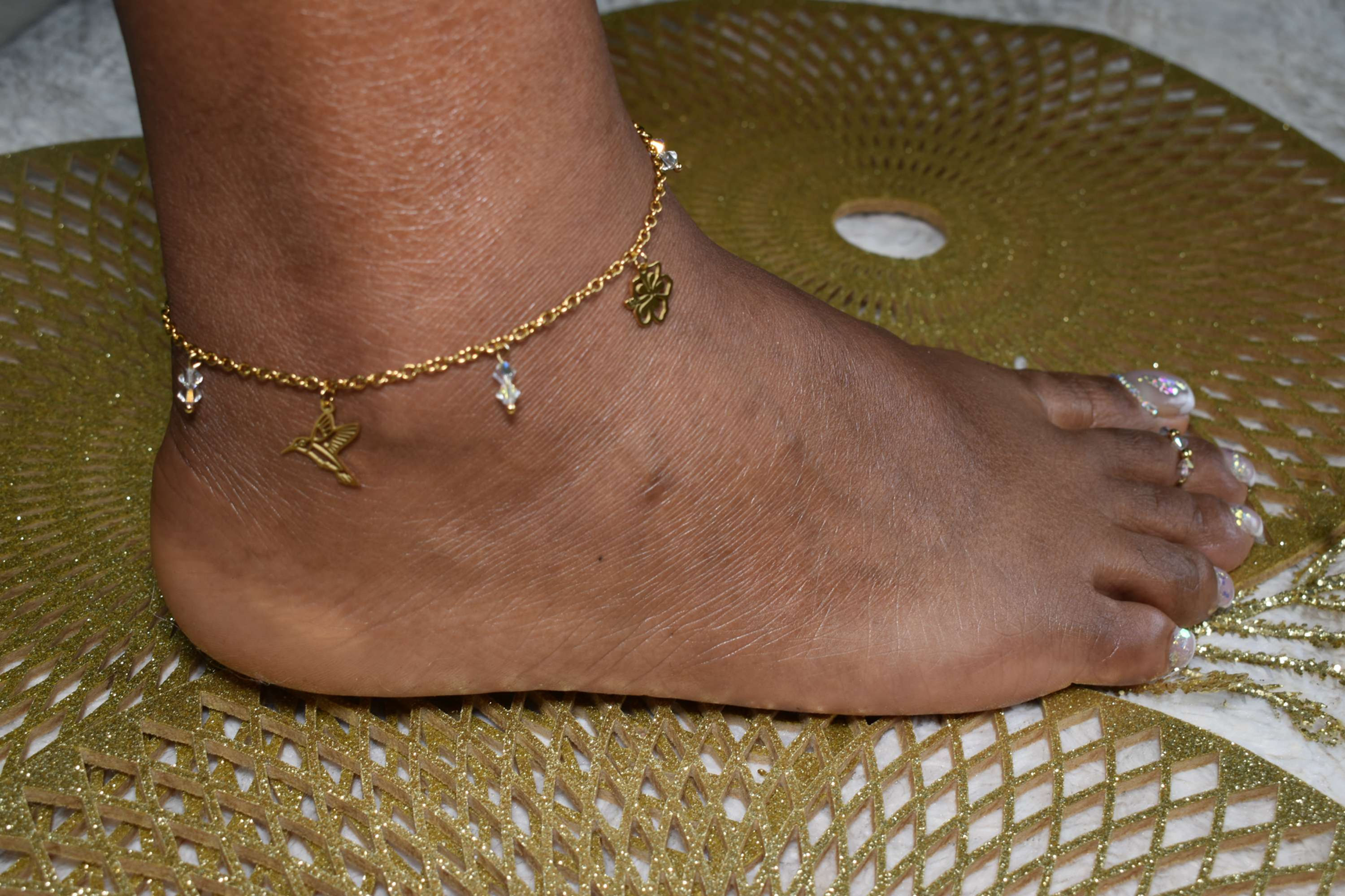 Chevillère Hibiscus et colibri en acier inoxydable