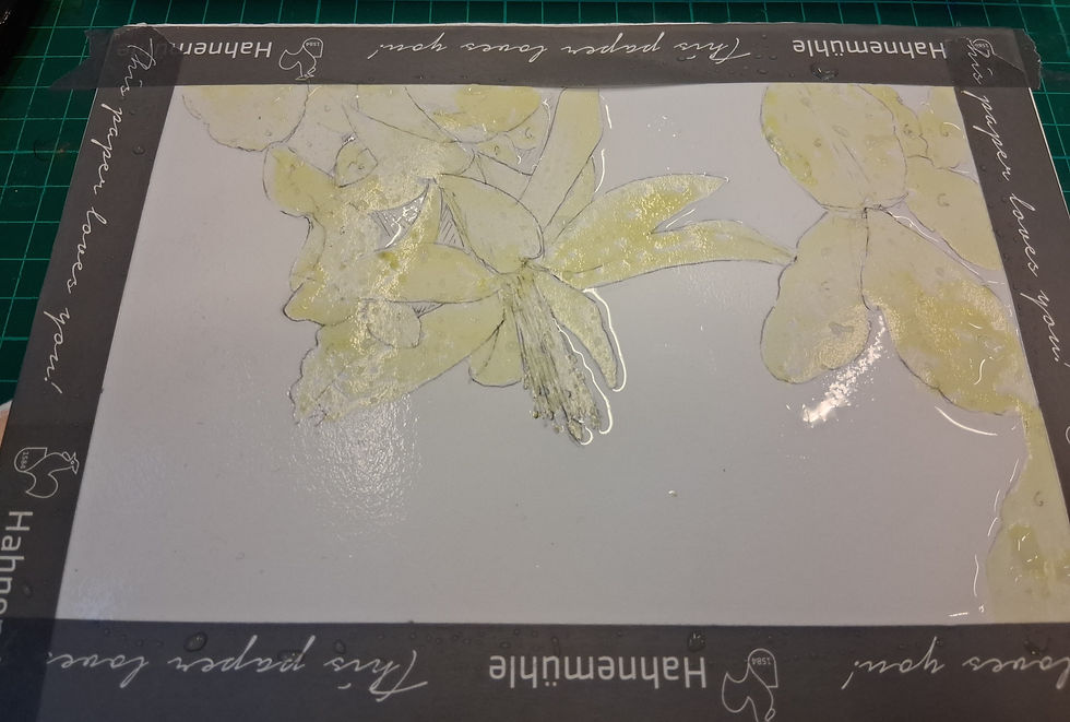 Een compleet nat vel papier, onder de maskeerlaag blijft het droog