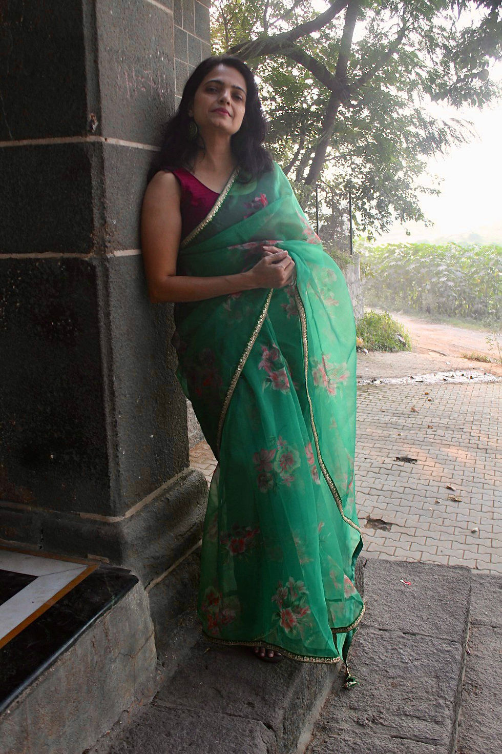 Thumbnail: Gleaming green organza Saree with fresh flowers and delicate tussles