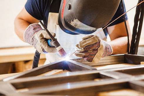 A Man Welding