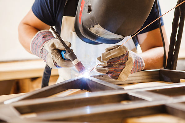 A Man Welding