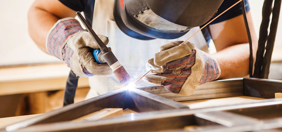 A Man Welding