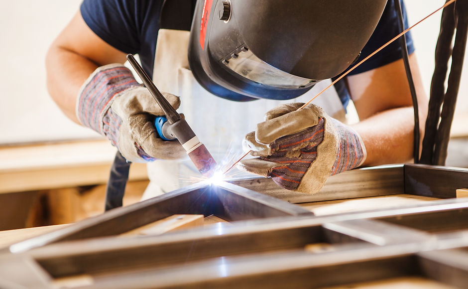 A Man Welding