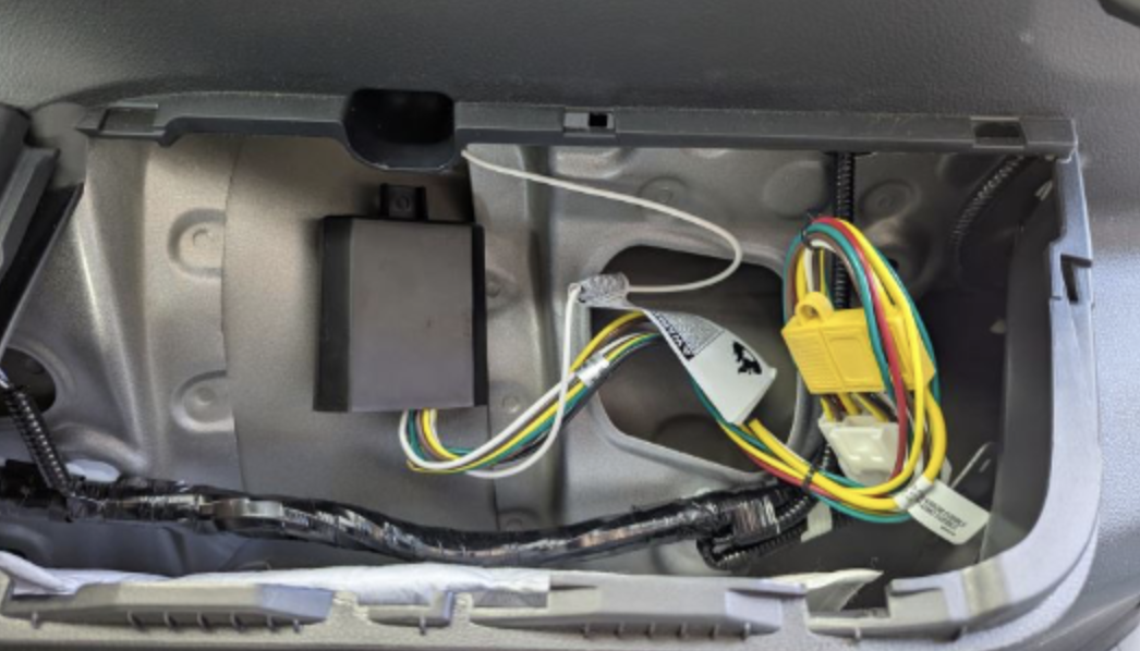 Toyota Highlander rear interior opened for powered trailer wiring installation