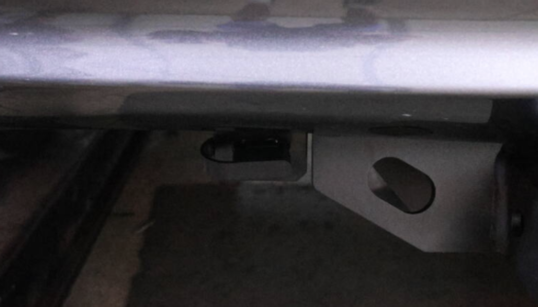 Toyota Highlander flat-4 trailer connector installed near the hitch receiver