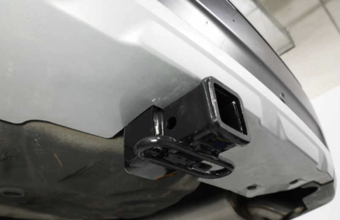 Rear view of a 2020 or newer Subaru Outback with a professionally installed trailer hitch