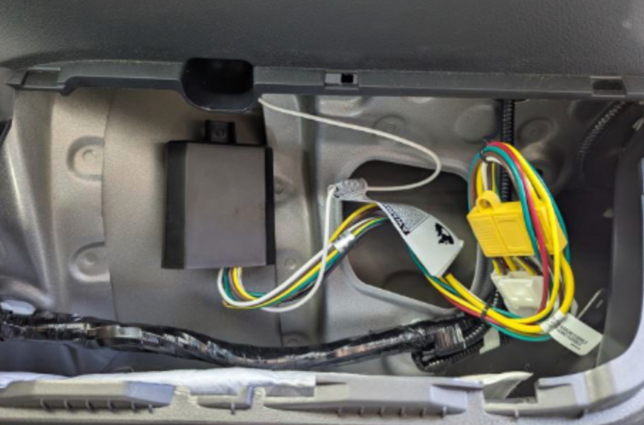 Toyota Grand Highlander rear interior opened for vehicle-specific trailer wiring