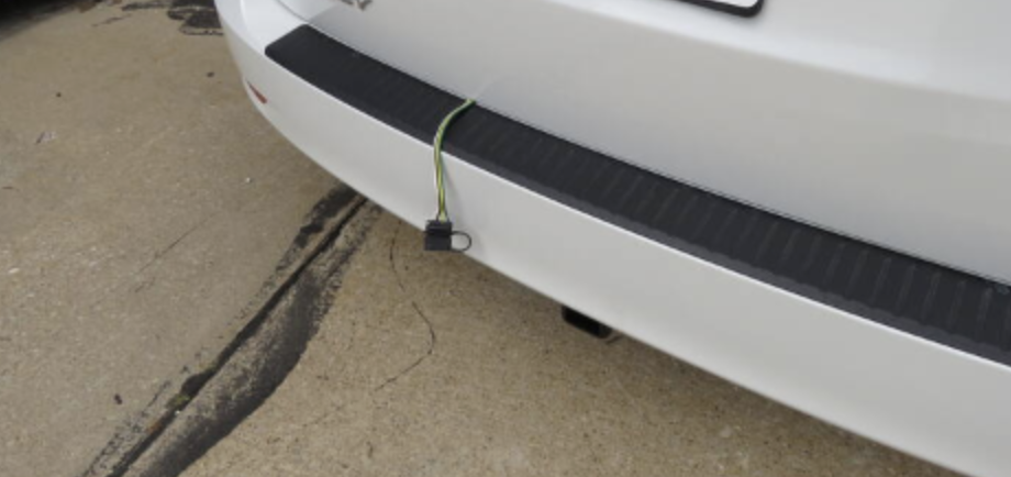 Installed trailer hitch and flat-4 connector on a Honda Odyssey