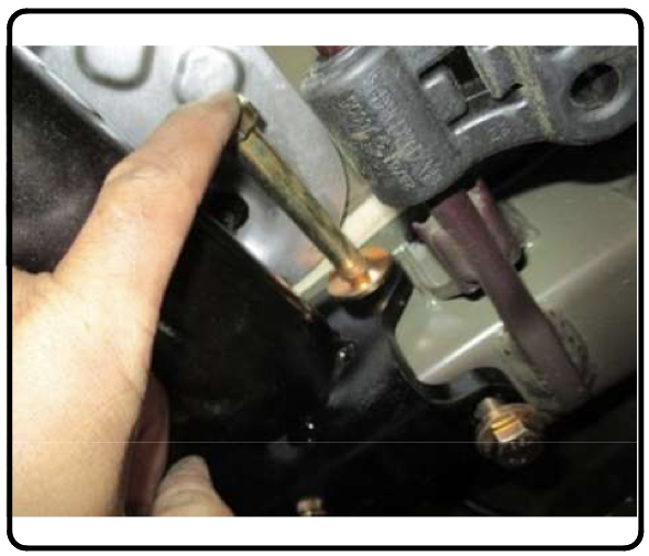 Kia Telluride hitch mounting hardware positioned at the factory frame location