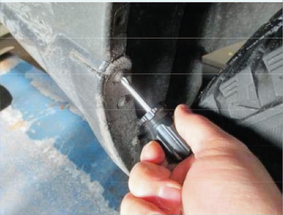 Rear bumper cover removed during 2010–2019 Subaru Outback hitch installation