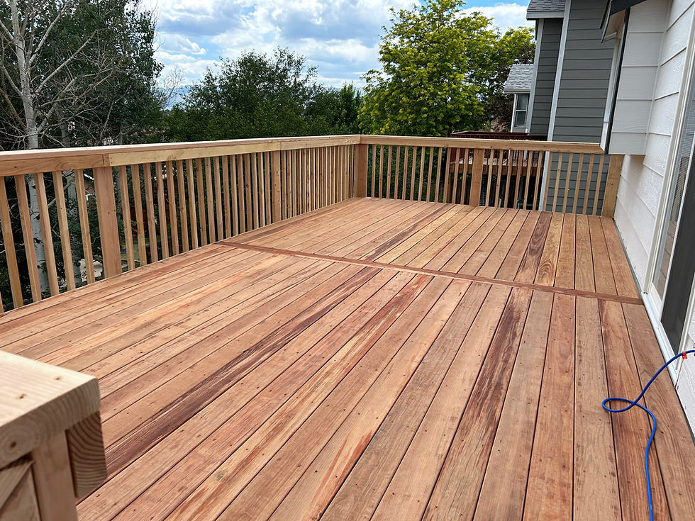 Newly finished wooden deck exterior home carpentry services