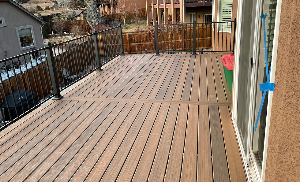 Modern deck featuring exterior home carpentry services.