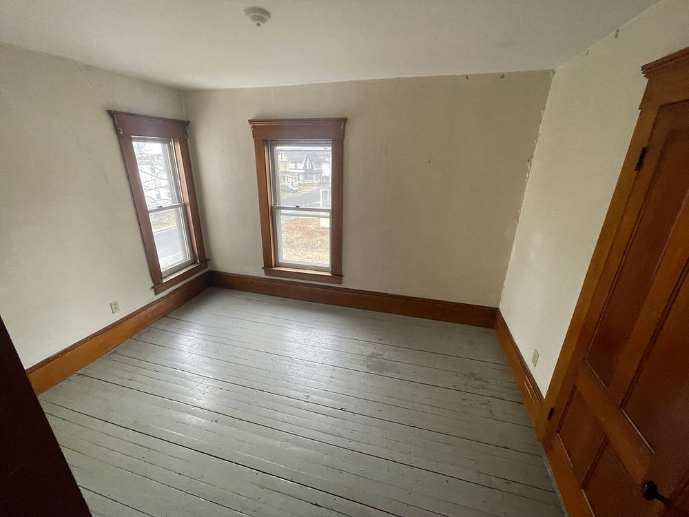 Painted Floors, plaster walls with layers of painted wallpaper.
