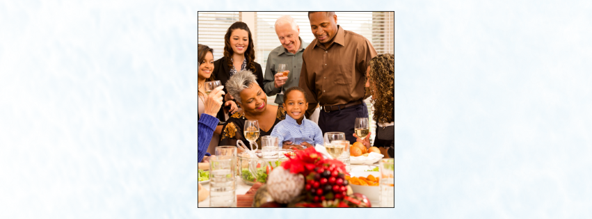 multi-ethnic family eating holiday dinner