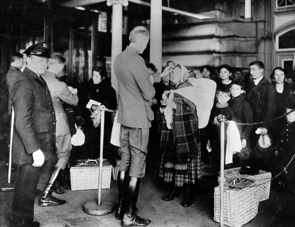 Public Health Officers Inspect Newly Arrived Immigrants at Ellis Island.  Dr. Anthony Carbone's Autobiography: Chapter 1 The Tailors' Legacy