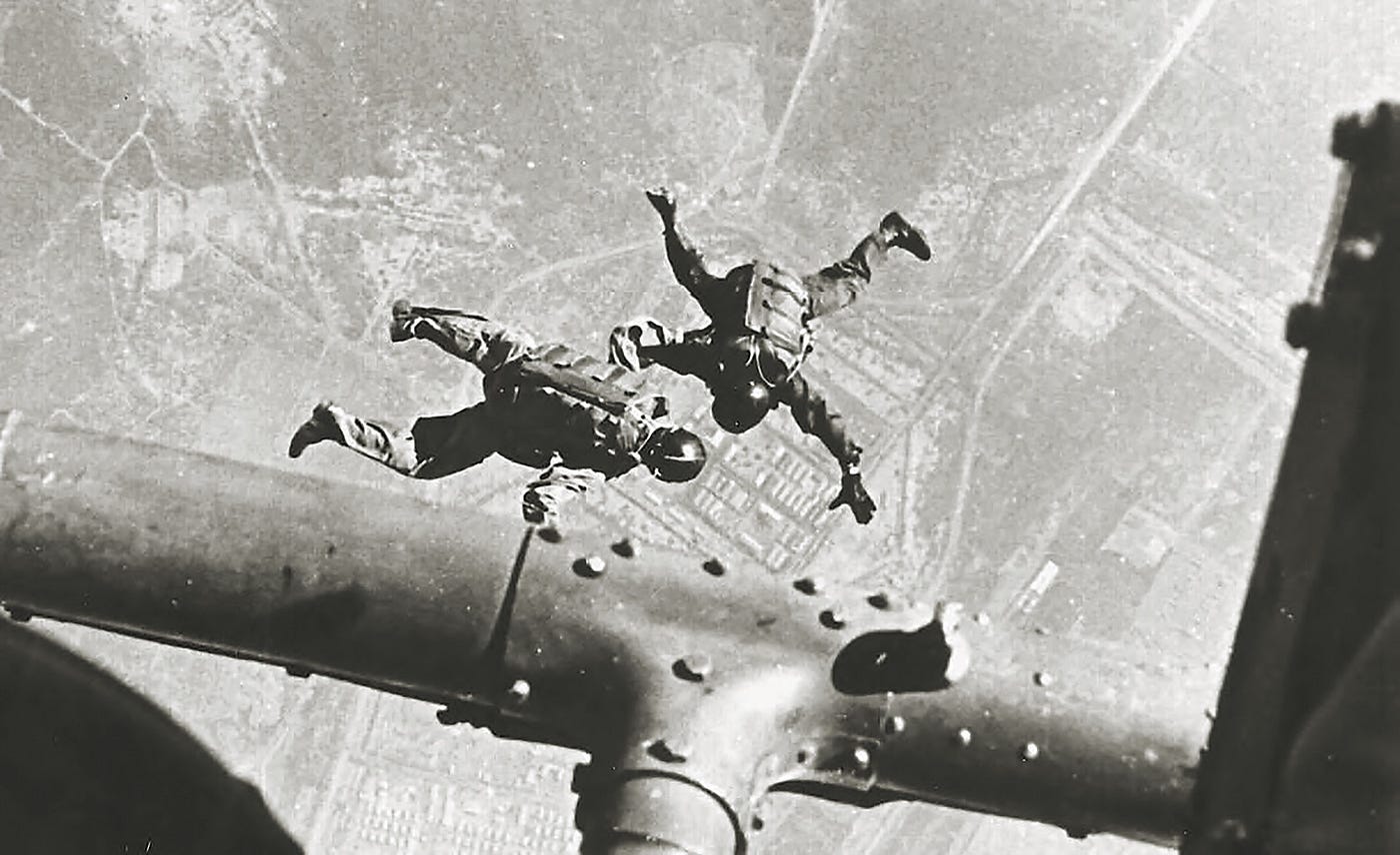 Photograph of 2 MACV-SOG HALO Jumpwe from a Huey Helicopter during the Vietnam War.Part of the autobiography of Dr. Anthony J. Carbone, Son in the Shadow of a Green Beret Hero.