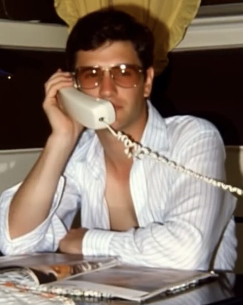 Anthony J. Carbone on the telephone talking to his girlfriend Mariann from his parents' military quarters at Carlisle Barracks while COL Carbone attended the U.S. Army War College (Summer of 1979).