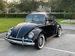 Black Volkswagen Beetle circa 1960 that 8 of us piled into to drive from Heidelberg, Germany to Paris, France when my Nana Carbone was visiting us in Heidelberg.Part of the autobiography of Dr. Anthony J. Carbone, Son in the Shadow of a Green Beret Hero