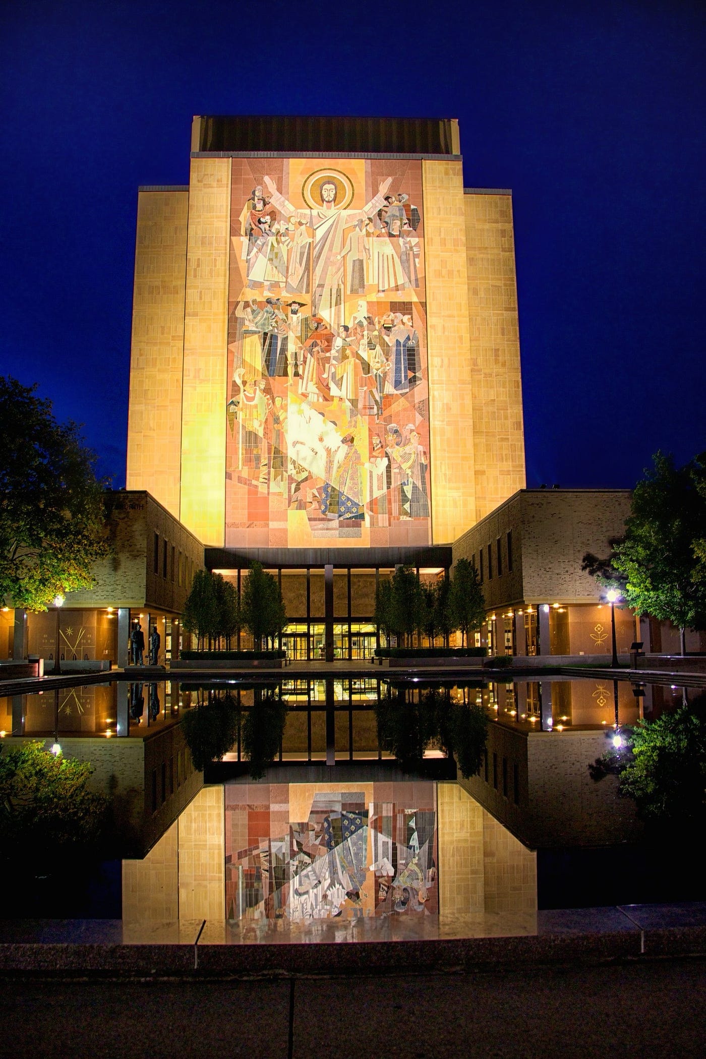 Notre Dame’s Hesburgh Library at Night (With “Touchdown Jesus” Mural)