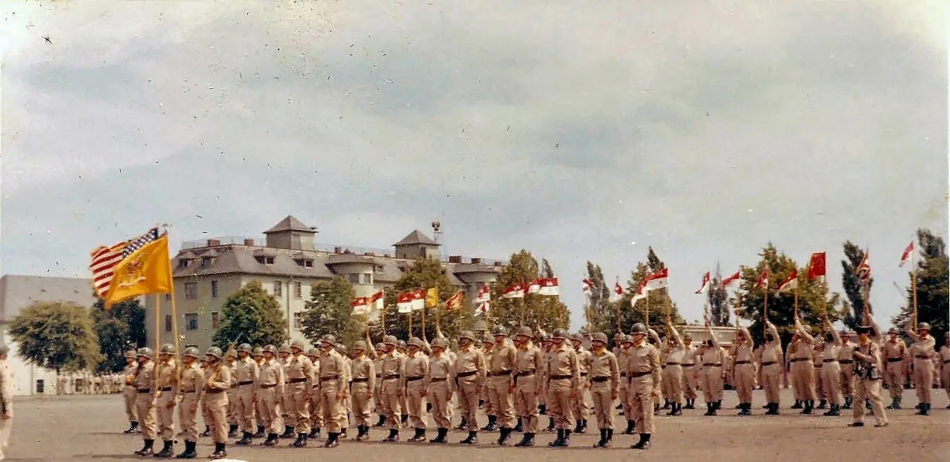 Colors and Guidons of the full 14th Armored Cavalry Regiment at Downs Barracks. CPT Tony Carbone is somewhere in the line with other troop commanders. The Troop C, 14 Cavalry guidon can be seen if you look close enough.