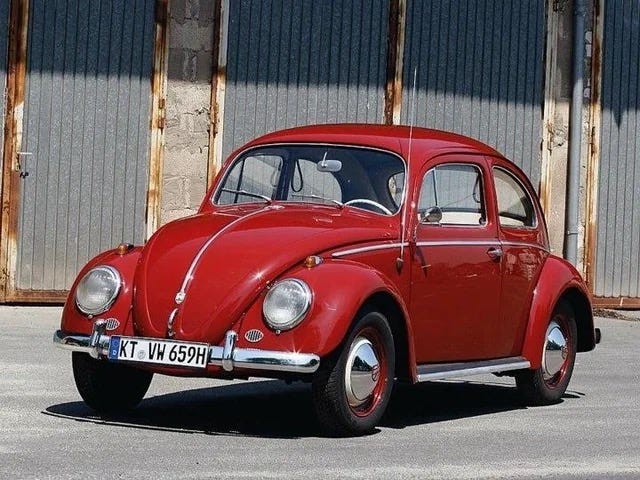 Photo of red Volkswagen Beetle circa 1970 similar Jeff Bell's.Part of autobiography of Dr. Anthony J. Carbone, Son in the Shadow of a Green Beret Hero.