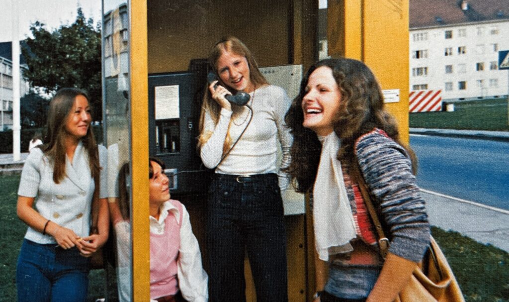Debbie Murray on the telephone with the popular girls from Mannheim American High School.Part of the autobiography of Dr. Anthony J. Carbone, Son in the Shadow of a Green Beret Hero.