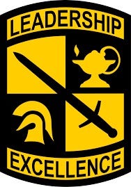 Army ROTC black and gold shoulder patch wit “Leadership” and “Excellence”. Autobiography of Dr. Anthony J. Carbone.