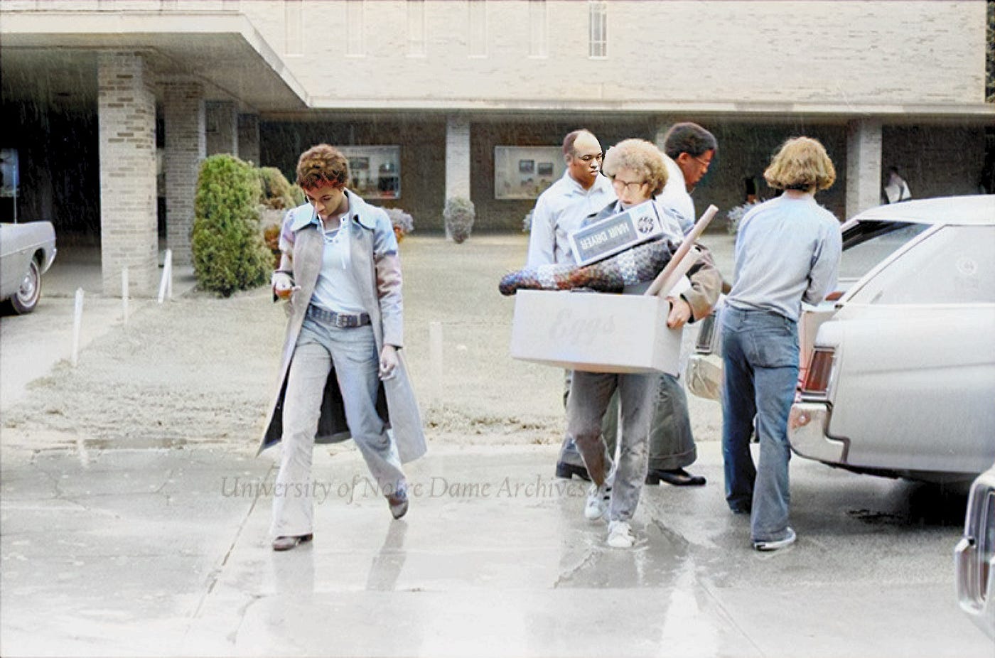 Freshmen filling up their dorm rooms with their families. University of Notre Dame. Dr. Carbone’s Autobiography.