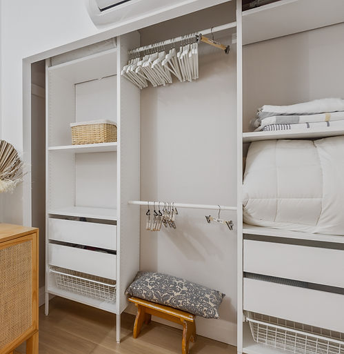 brown wooden bed frame with white bed mattress_edited.jpg