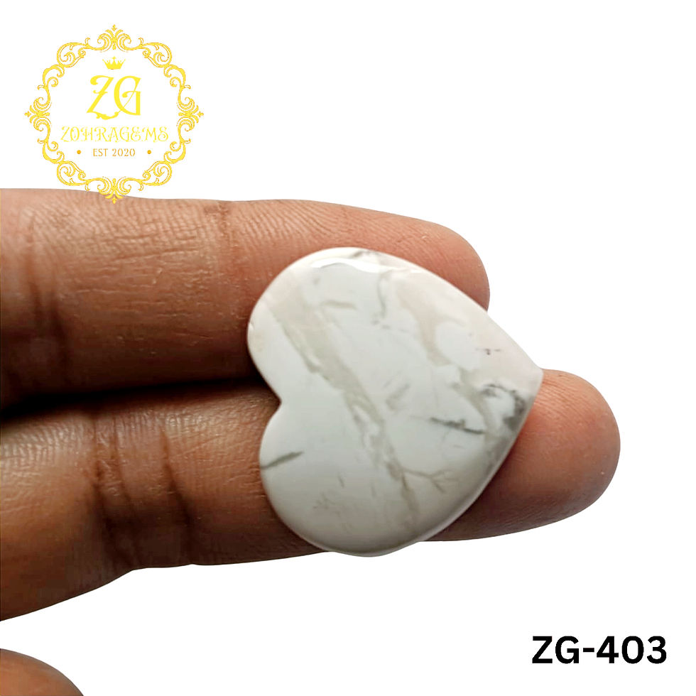 White iridescent howlite heart cabochon with calming energy and polished surface