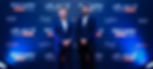 Muzzammil Ahussain and C.S. Soong standing in front of Almosafer banner