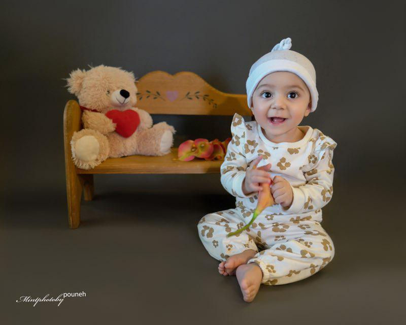 happy baby shots playing with this cute set up