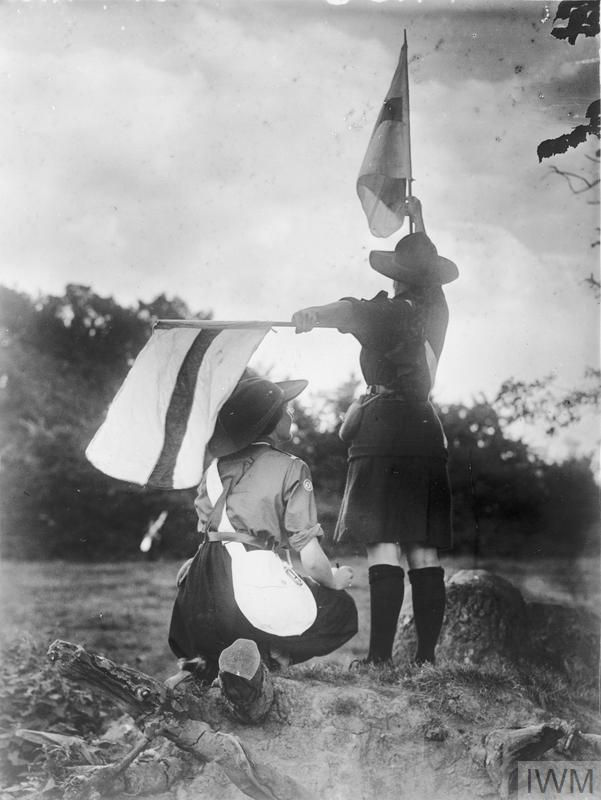 Horace Nicholls. Girl Guides Practising Semaphore Signaling, ca. 1914-18.© IWM, Item Q30965