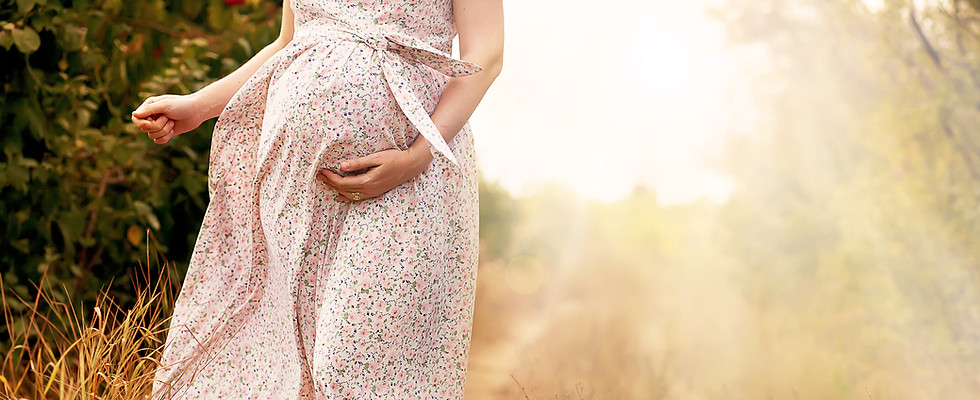Pregnant woman outdoors
