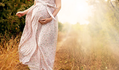 Pregnant woman outdoors