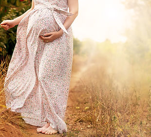 Pregnant woman outdoors