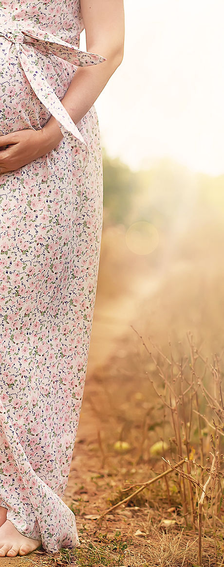 Pregnant woman in nature