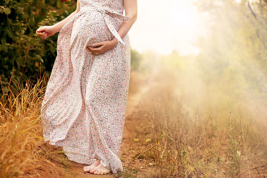 Pregnant woman in nature