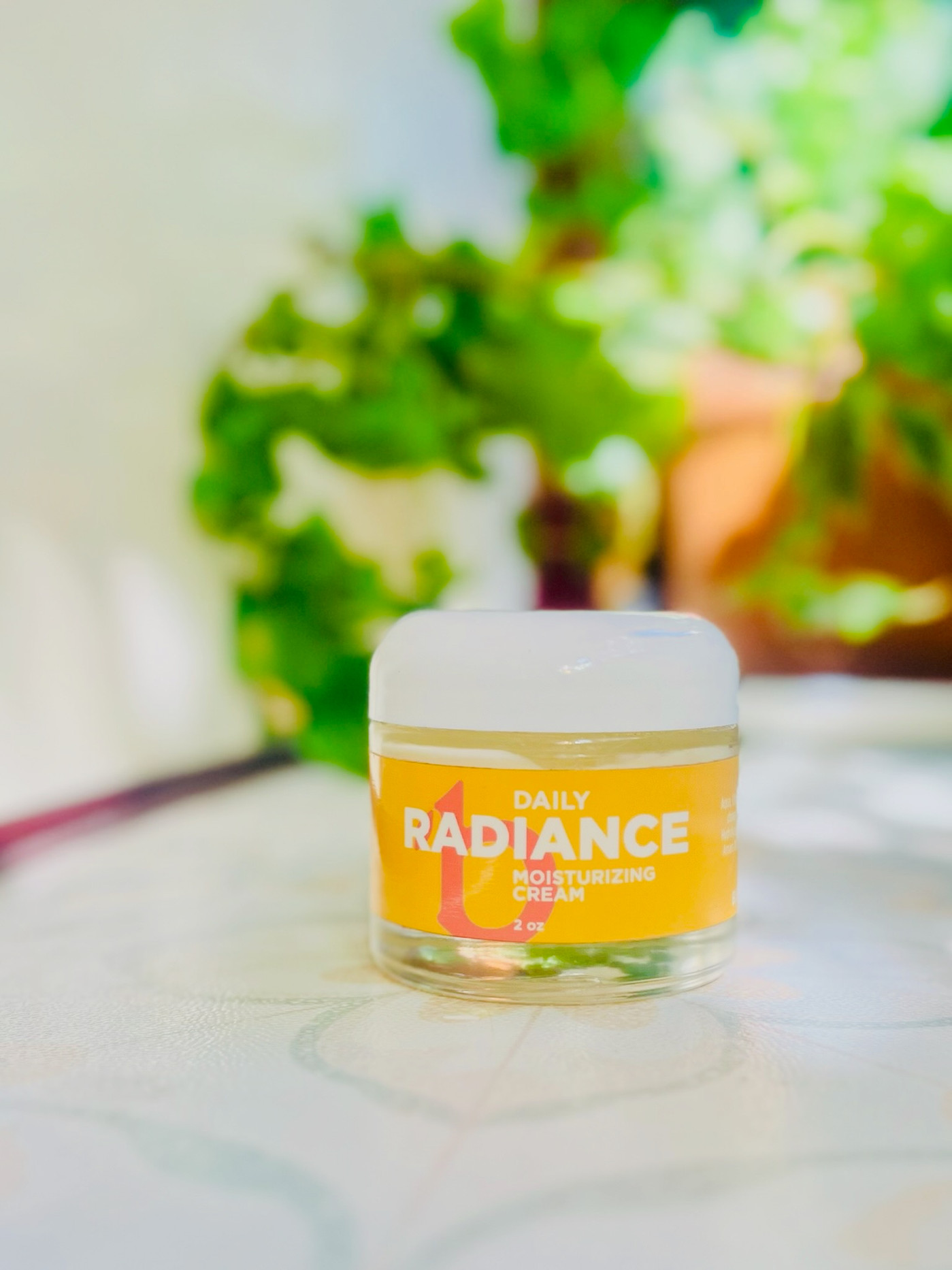 Daily Radiance cream in a clean minimalist jar.
