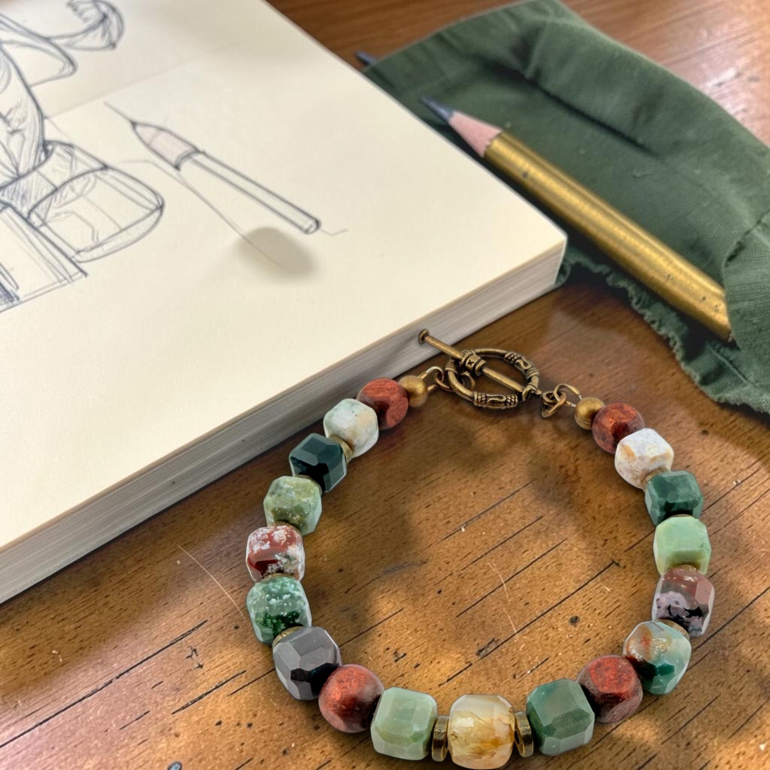 Fort Greene bracelet with Indian Agate cubes, square wood beads and antique bronze accents by BeauMarie’s.