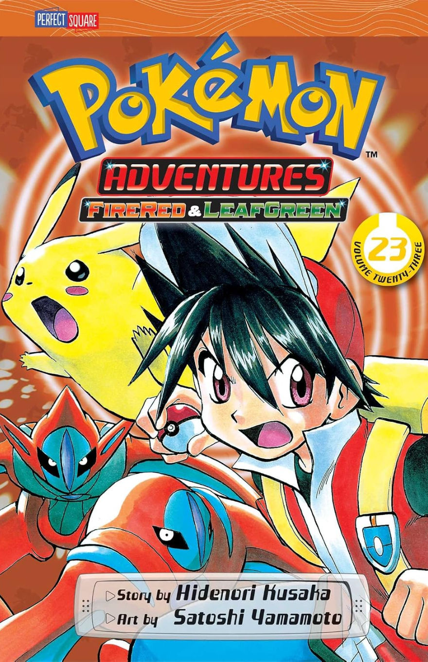 English (1st edition) cover of Pokémon Adventures volume 23. A red-orange background. Trainer Red is holding a Pokéball, surrounded by Pikachu, a Deoxys in Attack Forme and a Deoxys in Defense Forme.