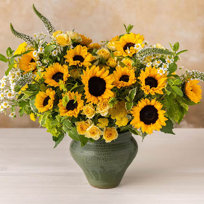 sunflowers un green vase