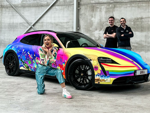 ANKA'S Porsche Taycan Cross Turismo wrapped in a custom designed vinyl wrap