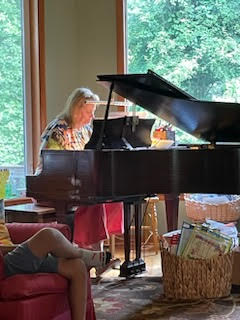 Kate Hofherr plays her piano at NoteZart Piano Studio in Virginia