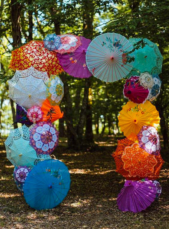wedding arch with colourful umbrellas