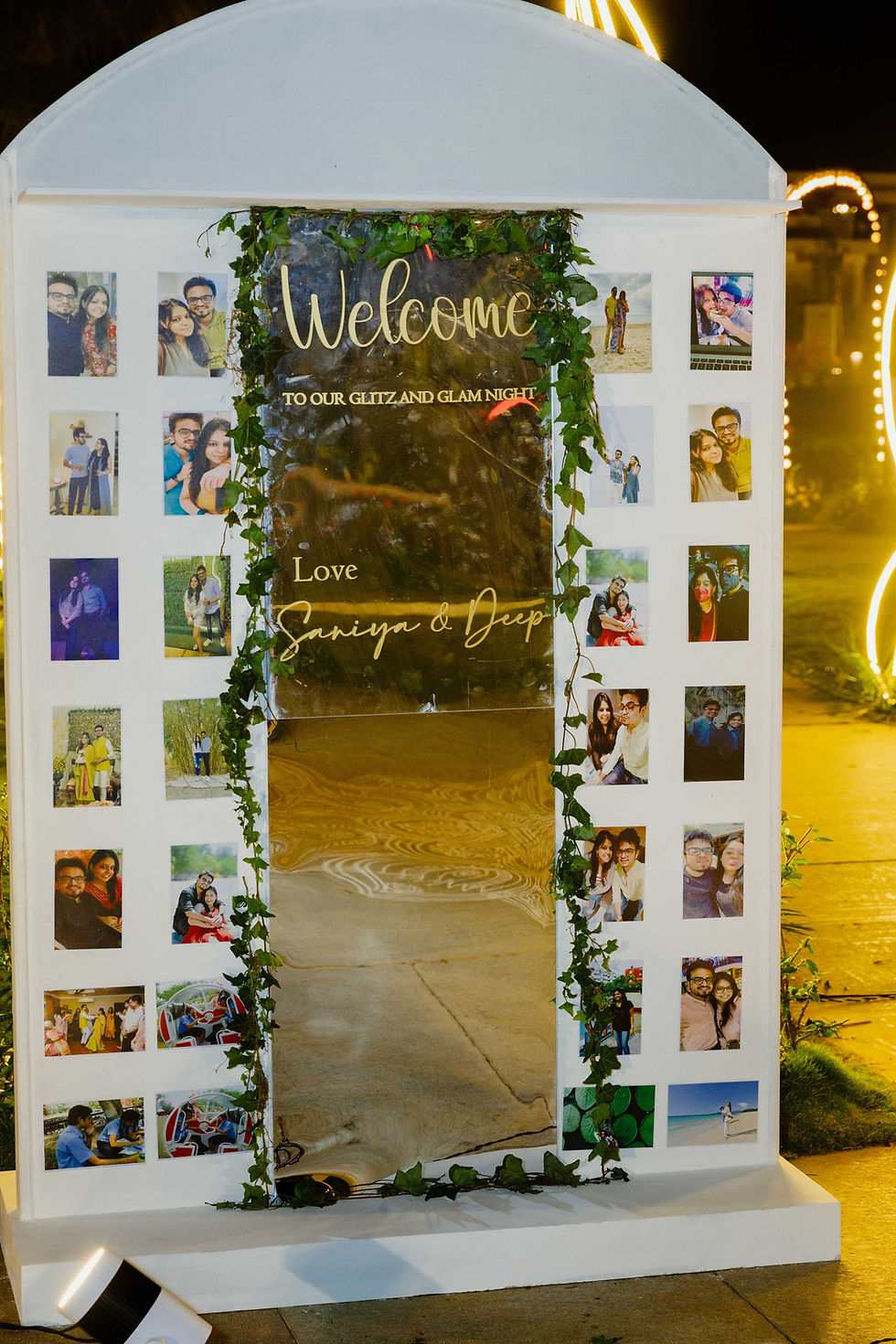sangeet welcome board with couple's old photos