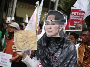 Aung San Suu Kyi accuses international community of stoking unrest in Myanmar