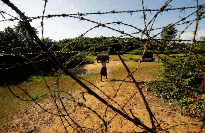 A Rohingya refugee at the Bangladesh border to MyanmarReuters